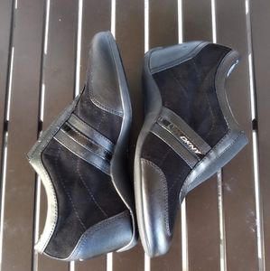 Women's black DKNY slip on wedge sneakers